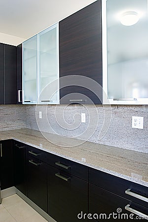 Modern contemporary style wood and glass kitchen Stock Photo