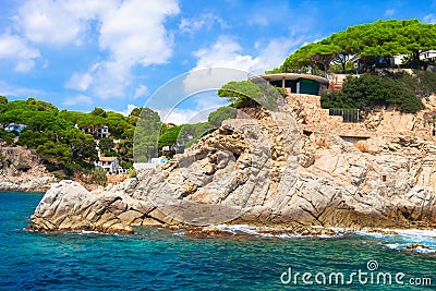 Modern cozy house on spanish coast on rocky high shore in mediterranean sea, Costa Brava, Spain Stock Photo