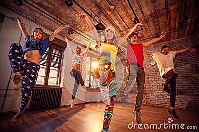 Modern dancing group practice dancing in jump. Sport, dancing an Stock Photo