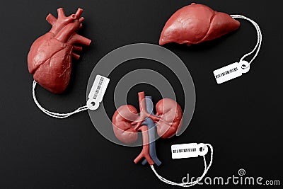 Modern day slavery, illegal trade of human organs on the black market and forced organ harvesting of death row inmates concept Stock Photo