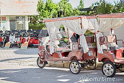 Modern decorated rickshaw on the road. Travel concept Editorial Stock Photo