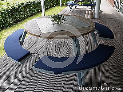 Modern design big round metal wooden table Stock Photo