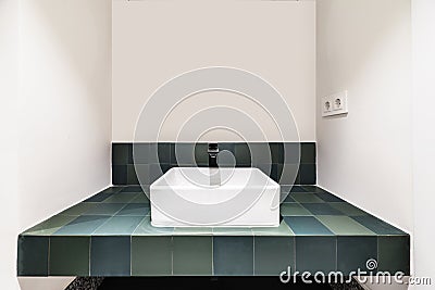 a modern designed bathroom one piece square porcelain sinks Stock Photo