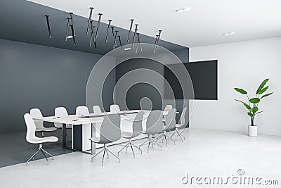 Modern designer meeting room interior with furniture, empty mock up presentation frame and daylight. Stock Photo