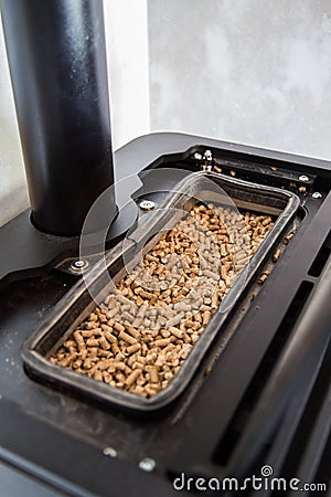 Modern domestic pellet stove Stock Photo