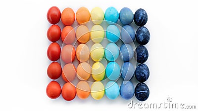 Modern easter concept. Colored eggs laid out in a square by color on a white background with copy space. Contemporary art easter Stock Photo