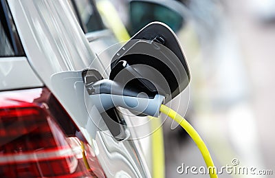 Modern electric car charging with power cable Stock Photo