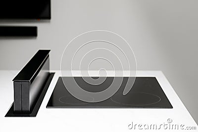 Modern electric ceramic stove top with hood Stock Photo