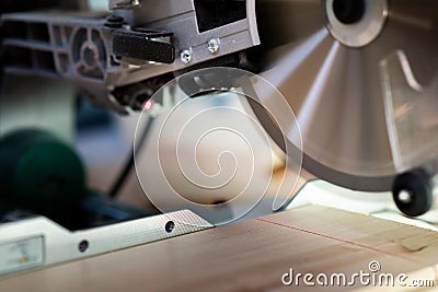 Modern electric circular saw in the workshop Stock Photo