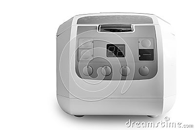 Modern electric slow cooker on a light background Stock Photo