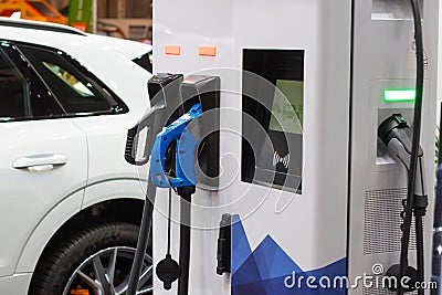 Modern electrical fast charger to electrical or hybrid PHEV automobiles. Future energy power. Ecology friendly charger. Clean Stock Photo