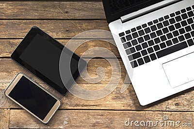 Modern electronic communication tools on a wooden floor Stock Photo