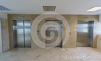 Modern elevators with closed doors Stock Photo