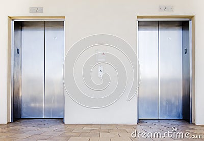 Modern elevators in office building Stock Photo