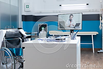 Modern empty doctors office having remore doctor talking Stock Photo