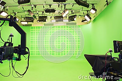 Modern empty green photo studio with modern style movie camera Stock Photo