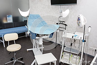 Modern european medical cabinet interior. Gynecological room with chair and equipment Stock Photo