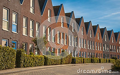 Modern family houses in a row Stock Photo