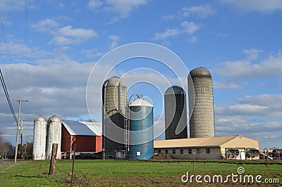 Farm with silos and grain driers Stock Photo