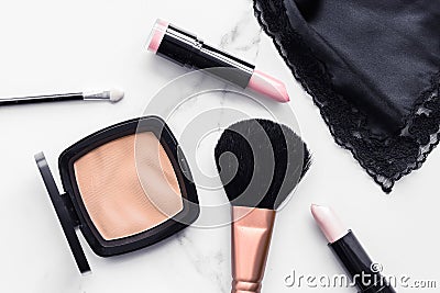 Make-up and cosmetics flatlay on marble Stock Photo