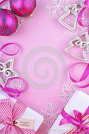 Modern festive pink theme Christmas holiday background with deco Stock Photo