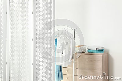 Modern folding in stylish room interior Stock Photo