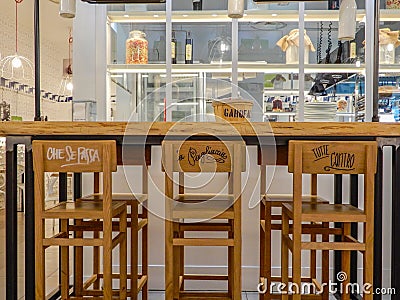 Modern forniture in a bar and restaurant in Genoa Genova, Italy. Editorial Stock Photo