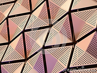 Modern geometric steel cladding with angular patterns Stock Photo