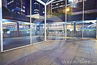 Modern glass perspective corridor Night Stock Photo