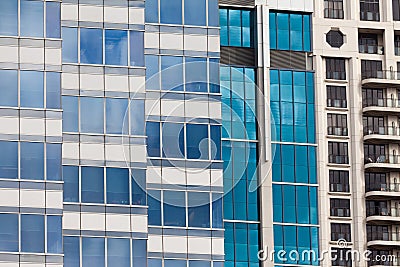 Modern glass-walled highriser building facade Stock Photo