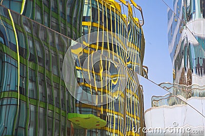 Modern glass walls reflecting abstract distorted reflection Stock Photo