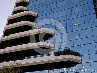Asymmetric Balconies on Modern Glass Fronted Building Stock Photo