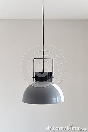 Modern gray loft chandelier. Loft style incandescent lamp. Stock Photo