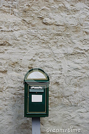 Modern green postbox Stock Photo