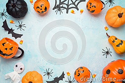 Modern Halloween frame border background with pumpkin and decorations. Greeting card or party invitation mock up. Top view with Stock Photo