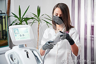 Modern hardware cosmetology, device for ultrasonic SMAS-lifting. Stock Photo