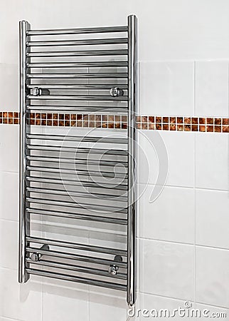 Modern Heated towel rail Stock Photo