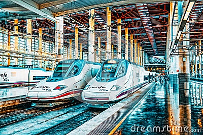 Modern hi-speed passenger train of Spanish railways company-Renf Editorial Stock Photo