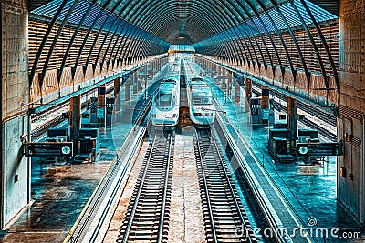 Modern hi-speed passenger train of Spanish railways company-Renf Editorial Stock Photo