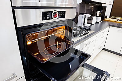 Modern hi-tek kitchen, oven with door open Stock Photo
