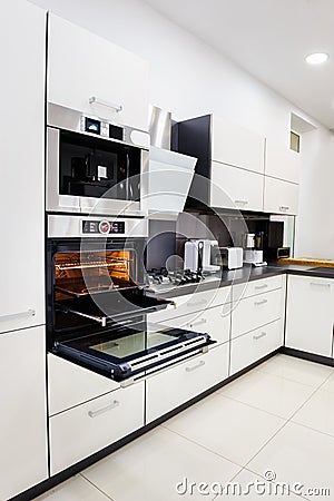 Modern hi-tek kitchen, oven with door open Stock Photo