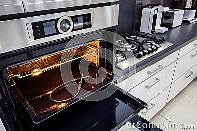 Modern hi-tek kitchen, oven with door open Stock Photo