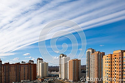 Modern high-rise architecture with scenic clouds on blue sky Stock Photo