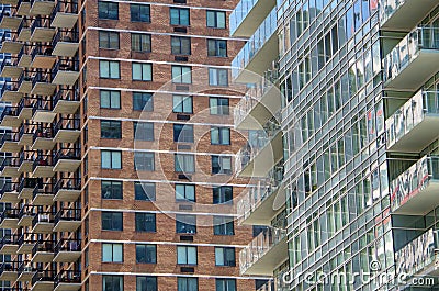 Modern high rise balconies and windows intersecting background Stock Photo