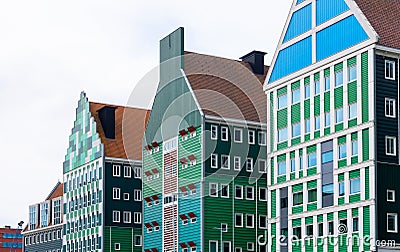 Modern High Rise Buildings with Blue and Green Colored traditional Dutch style buildings in Zaandam, Netherlands Stock Photo