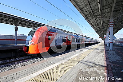 Modern high-speed train `Lastochka`. Little Ring of the Moscow Railways, is a 54.4-kilometre-long orbital railway.Russia Editorial Stock Photo