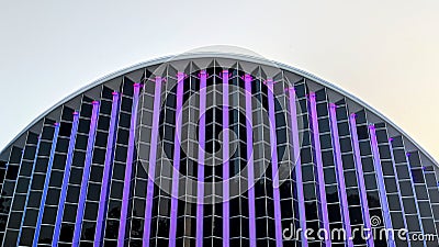 Modern high-tech building facade. Shining neon, LED backlight Stock Photo