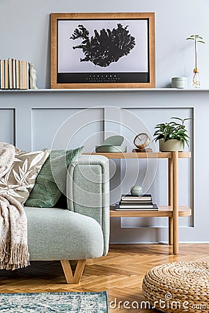 Modern home staging of living room with design mint sofa, mock up poster map and decoration. Stock Photo