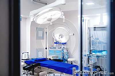 Modern hospital with operating room details. Empty emergency surgery room with medical equipment Stock Photo