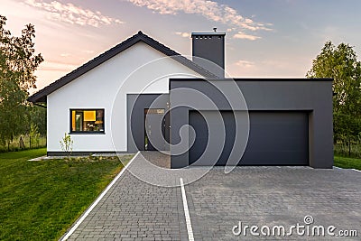 Modern house with big garage Stock Photo